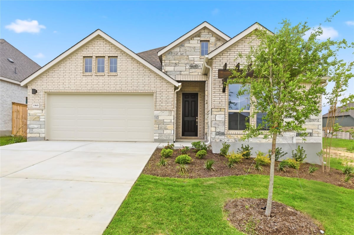 View 13601 Hamilton Hart Dr in Briarwood 13601 Hamilton Hart Dr - front exterior - Luxury home in Briarwood, Elgin, TX
