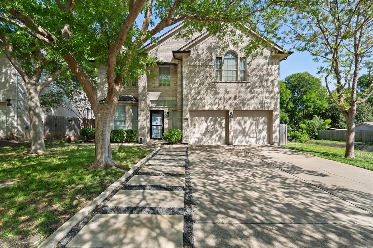 View 13605 Campesina Dr in Scofield Farms Ph 08 Sec 07 13605 Campesina Dr - front exterior - Luxury home in Scofield Farms Ph 08 Sec 07, Austin, TX