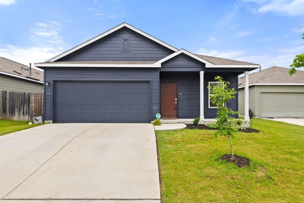 View 13608 Buckalew St in ELM CREEK NORTH PHS 1 13608 Buckalew St - front exterior - Luxury home in ELM CREEK NORTH PHS 1, Elgin, TX
