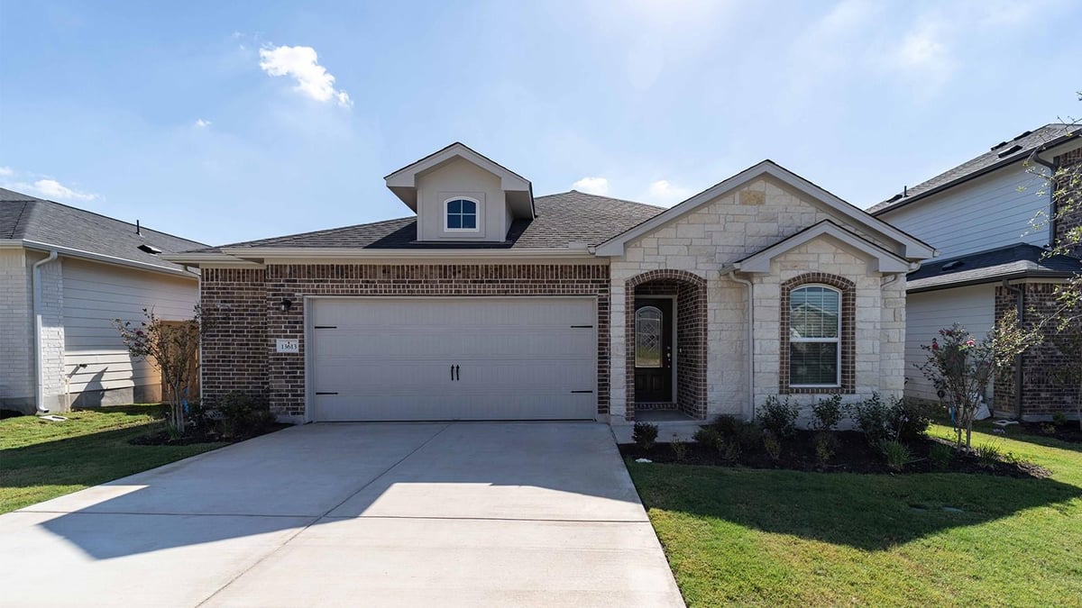 View 13613 Endless Narrow Ln in Briarwood 13613 Endless Narrow Ln - front exterior - Luxury home in Briarwood, Elgin, TX