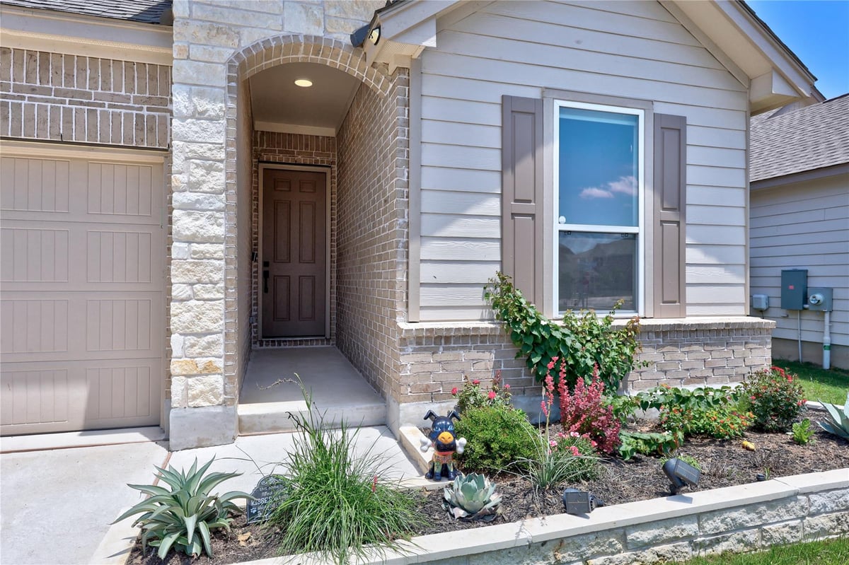 View 137 Lost Treasure TER in Retreat at San Gabriel 137 Lost Treasure TER - front exterior - Luxury home in Retreat at San Gabriel, Georgetown, TX