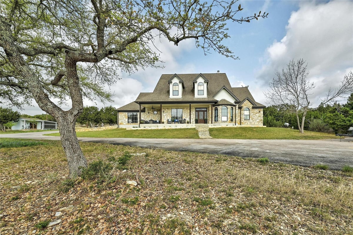 View 13700 Evergreen Way in Whispering Oaks Subd Phase Two 13700 Evergreen Way - front exterior - Luxury home in Whispering Oaks Subd Phase Two, Austin, TX