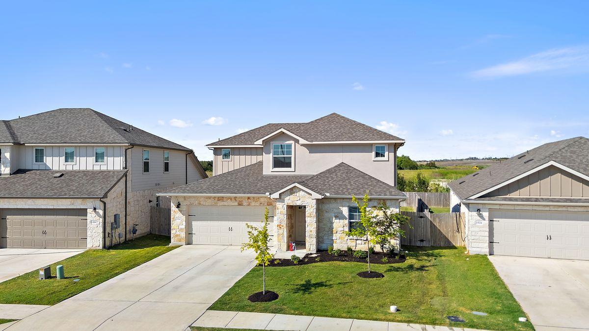 View 13720 Heartland Dr in Shadowglen Ph 2 Secs 27A-27B 13720 Heartland Dr - front exterior - Luxury home in Shadowglen Ph 2 Secs 27A-27B, Manor, TX