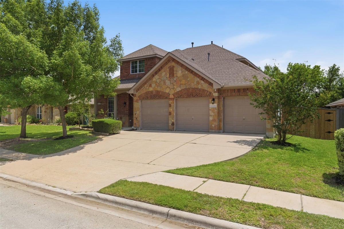 View 13724 Field Spar DR in Shadowglen Ph 01 Sec 06 13724 Field Spar DR - front exterior - Luxury home in Shadowglen Ph 01 Sec 06, Manor, TX