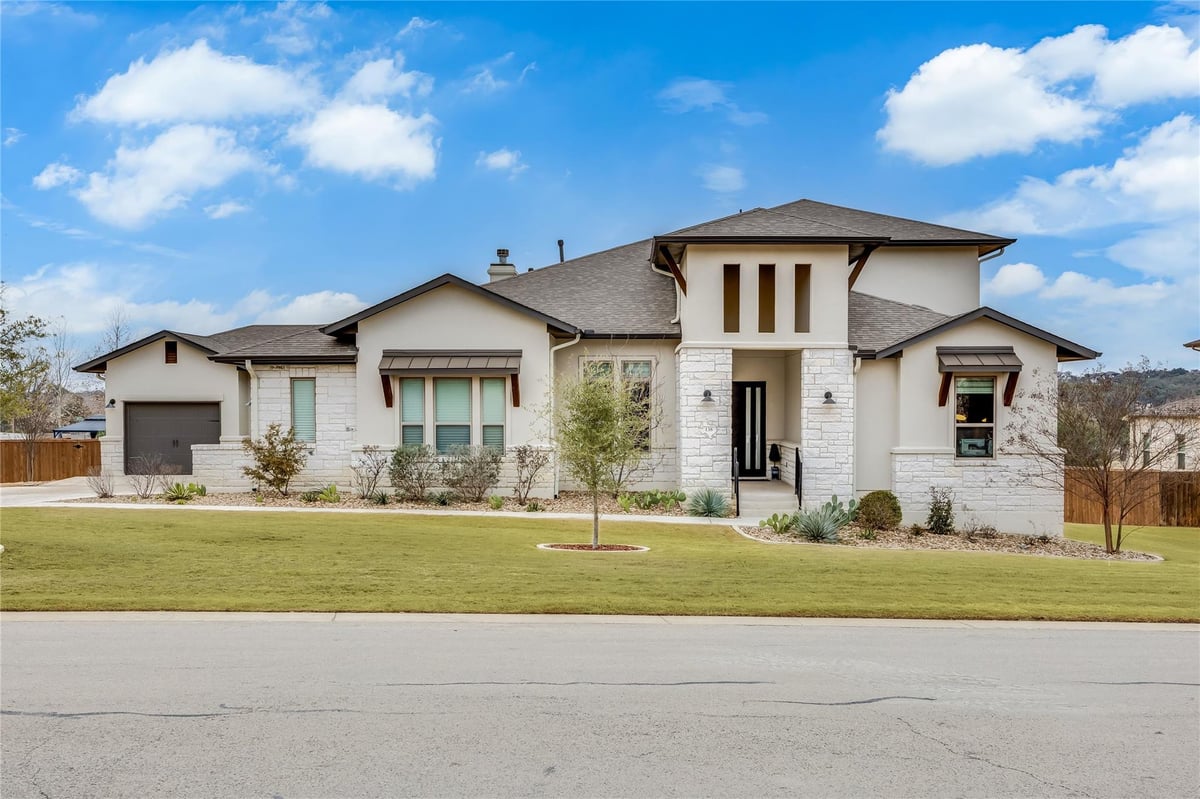 View 138 Evelyn Ct in Caliterra Ph One Sec Two 138 Evelyn Ct - front exterior - Luxury home in Caliterra Ph One Sec Two, Dripping Springs, TX