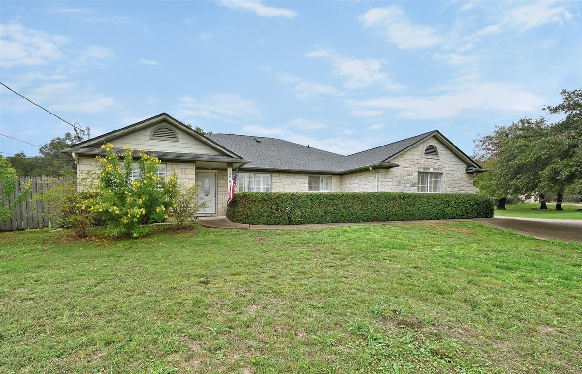 View 13810 Fm 1826 in The Hills Of Texas Ph 1 13810 Fm 1826 - front exterior - Luxury home in The Hills Of Texas Ph 1, Austin, TX