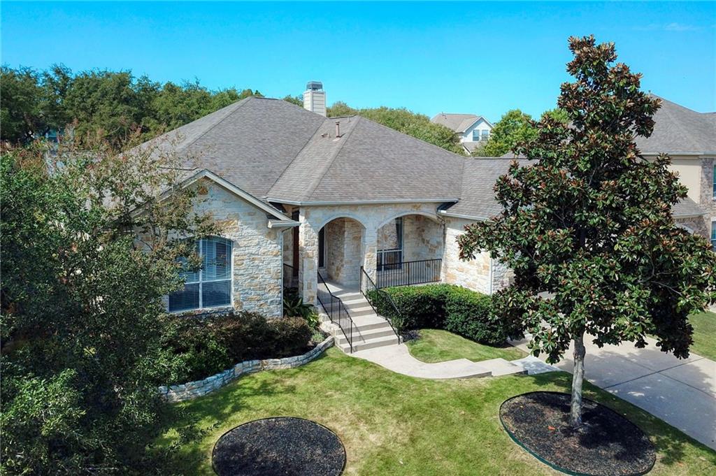 View 140 Cork Ln in Belterra Ph Ii Sec 9A 140 Cork Ln - front exterior - Luxury home in Belterra Ph Ii Sec 9A, Austin, TX