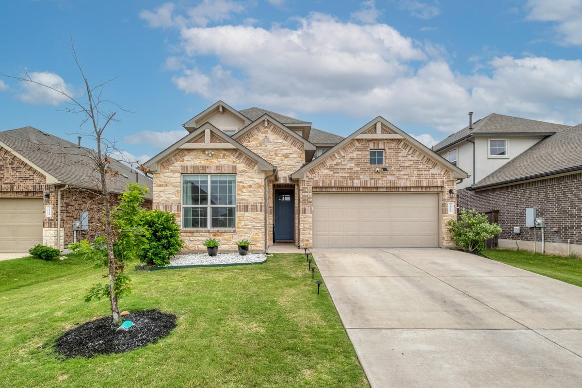 View 14005 McArthur Dr in SHADOWGLEN 14005 McArthur Dr - front exterior - Luxury home in SHADOWGLEN, Manor, TX