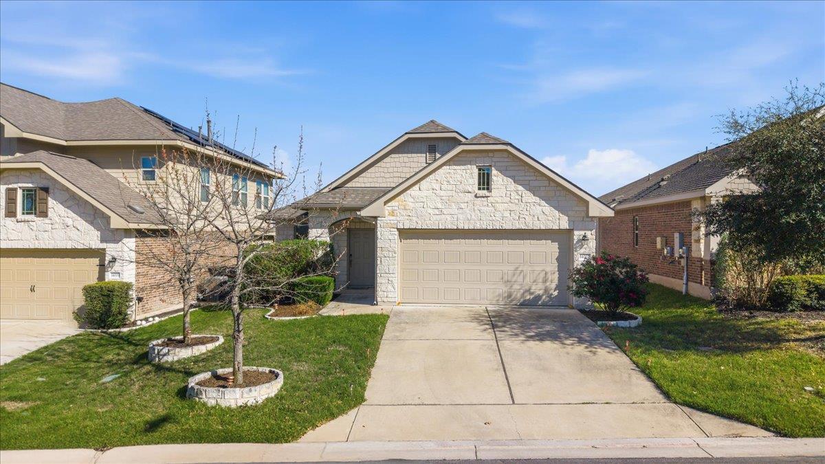 View 14007 Cantata Ln Unit #96 in Retreat At Harris Ridge Condom 14007 Cantata Ln Unit #96 - front exterior - Luxury home in Retreat At Harris Ridge Condom, Pflugerville, TX