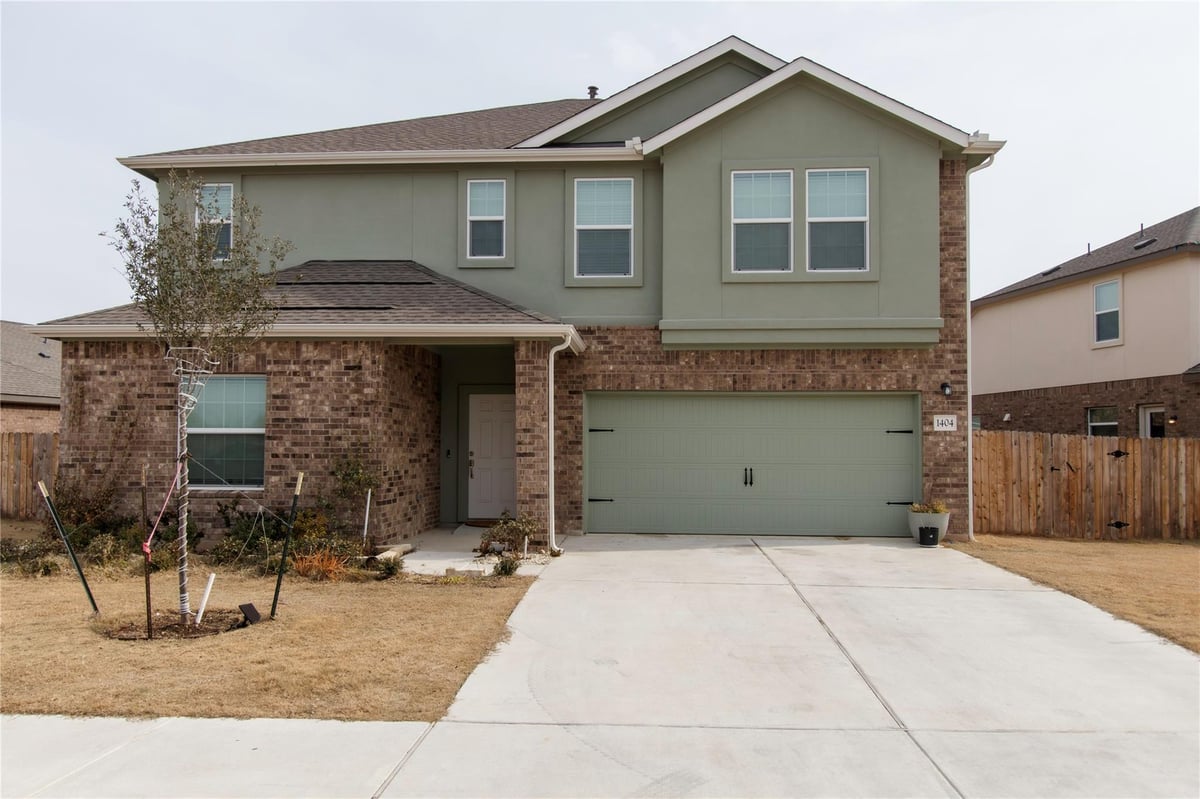 View 1404 E Aquilla Dr in Devine Lake Ph 4 1404 E Aquilla Dr - front exterior - Luxury home in Devine Lake Ph 4, Leander, TX