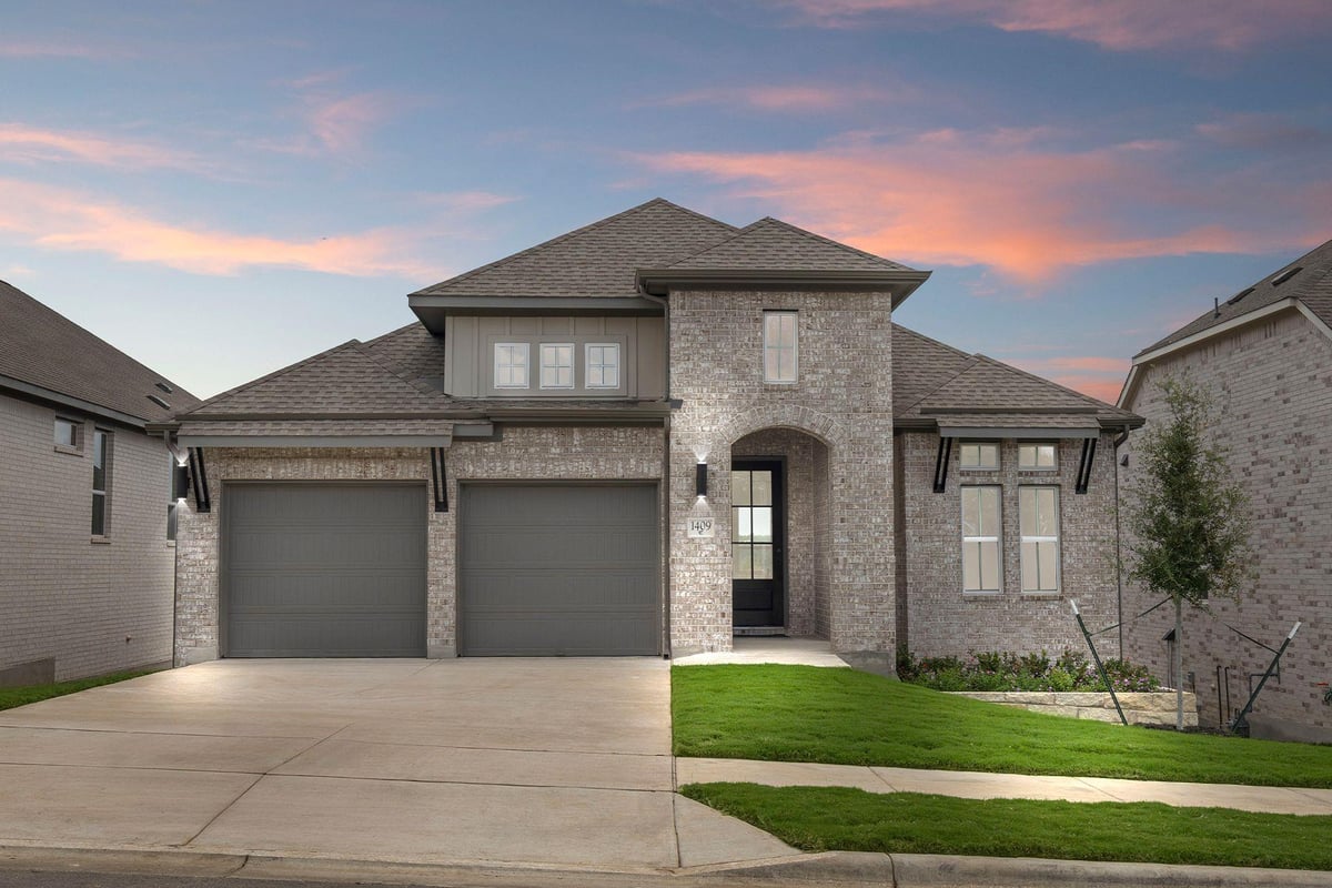 View 1409 Blue Moon Dr in Wolf Ranch West Bend 1409 Blue Moon Dr - front exterior - Luxury home in Wolf Ranch West Bend, Georgetown, TX