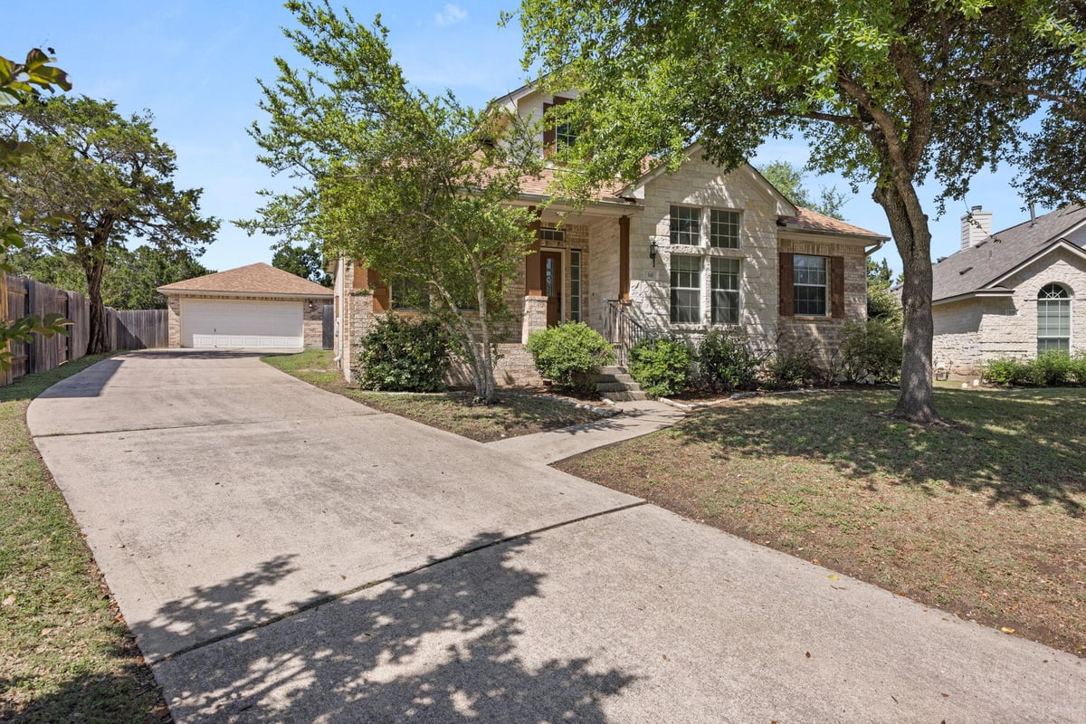 View 141 Stratton Ct in Belterra Ph 1 Sec 3A 141 Stratton Ct - front exterior - Luxury home in Belterra Ph 1 Sec 3A, Austin, TX