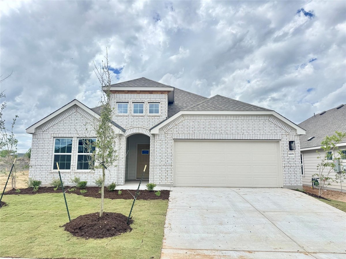 View 14208 Grassley TRL in Carillon 14208 Grassley TRL - front exterior - Luxury home in Carillon, Manor, TX