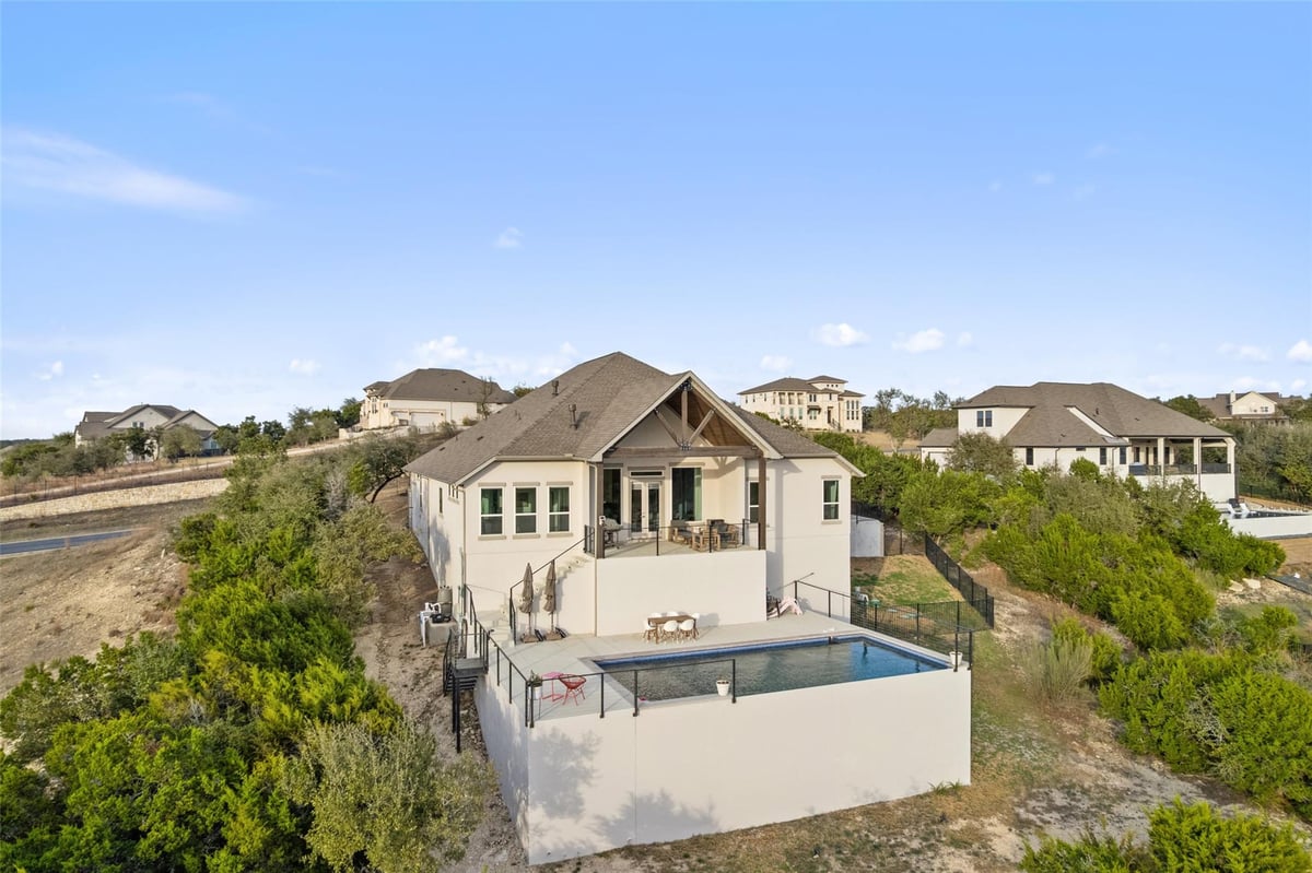 View 144 Sunny's Halo Ct in Saratoga Hills 144 Sunny's Halo Ct - front exterior - Luxury home in Saratoga Hills, Austin, TX