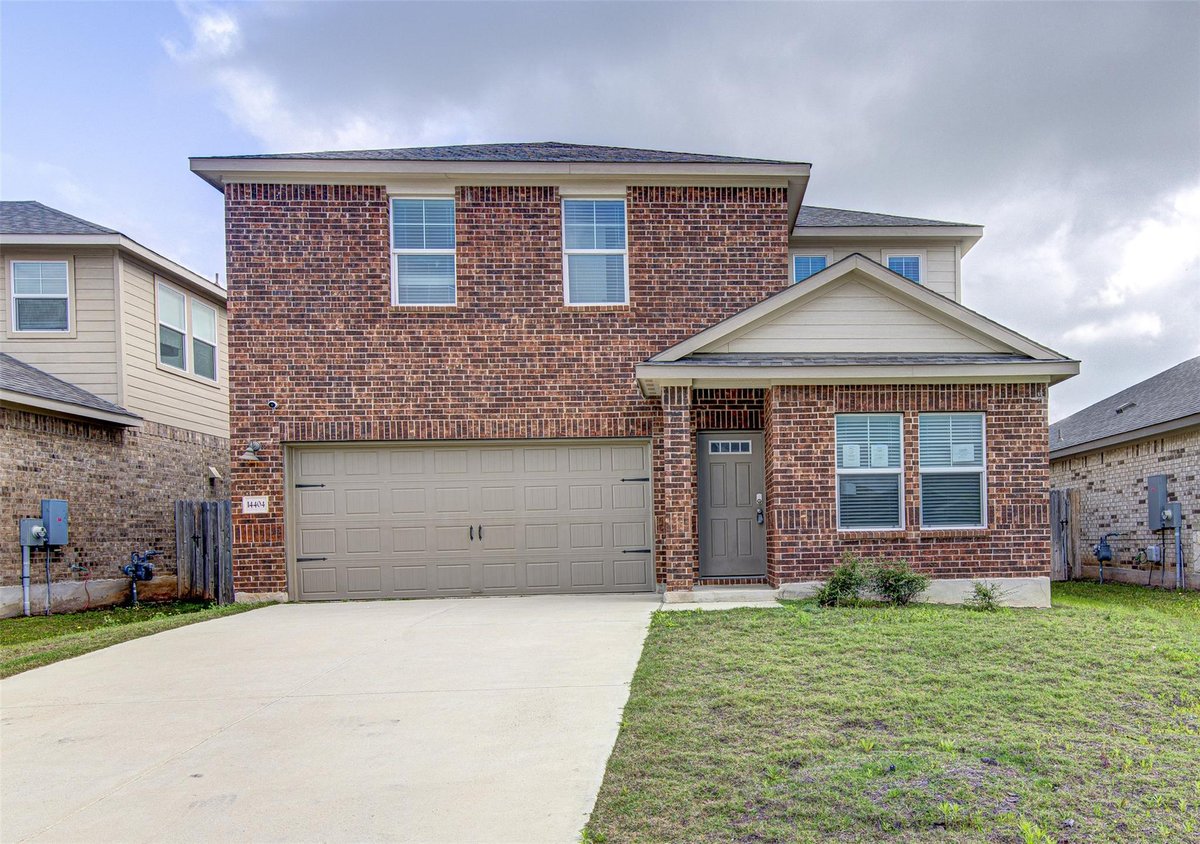 View 14404 Castleford Dr in Shadowolen Ph 2 Secs 25-26 14404 Castleford Dr - front exterior - Luxury home in Shadowolen Ph 2 Secs 25-26, Manor, TX