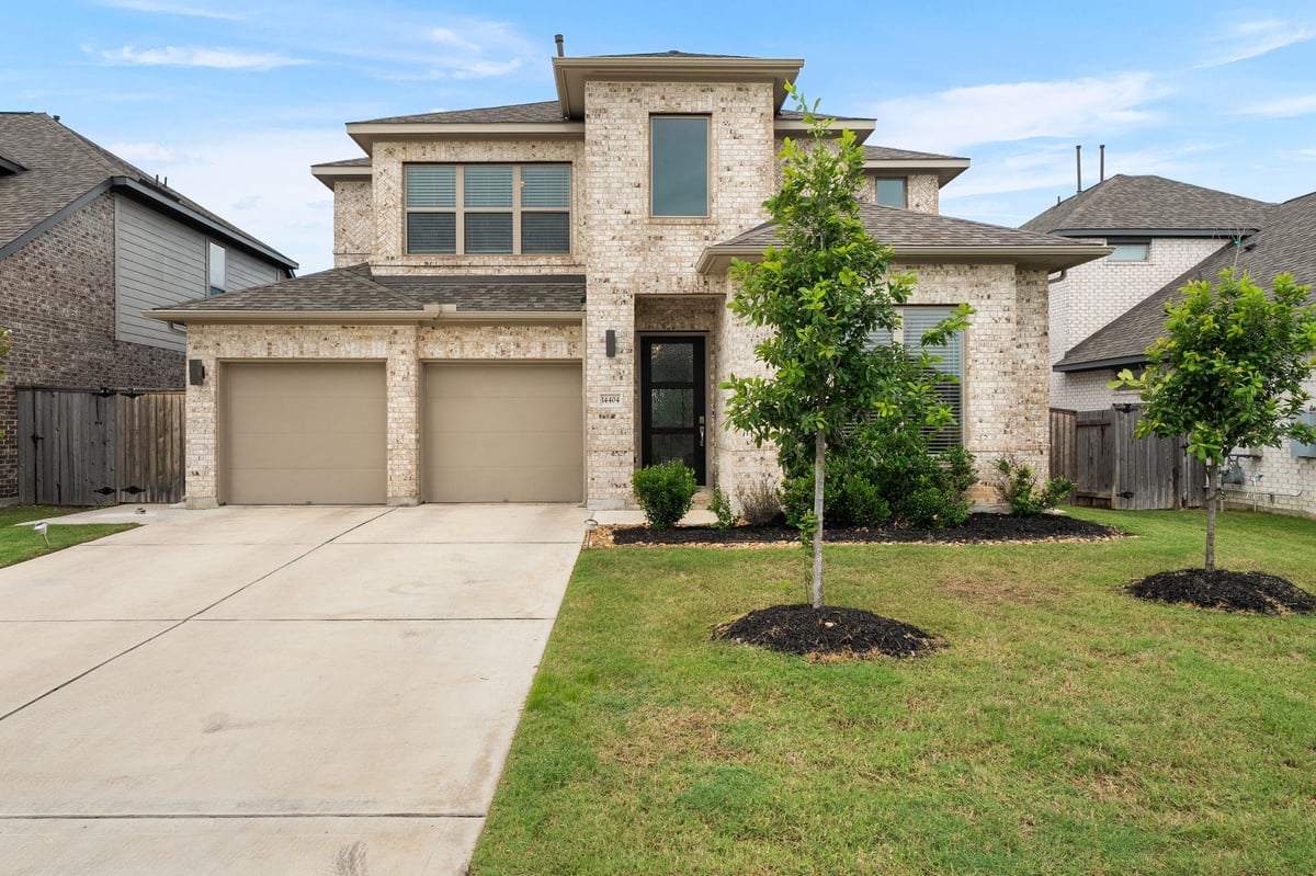 View 14404 Kira LN in SHADOWGLEN 14404 Kira LN - front exterior - Luxury home in SHADOWGLEN, Manor, TX
