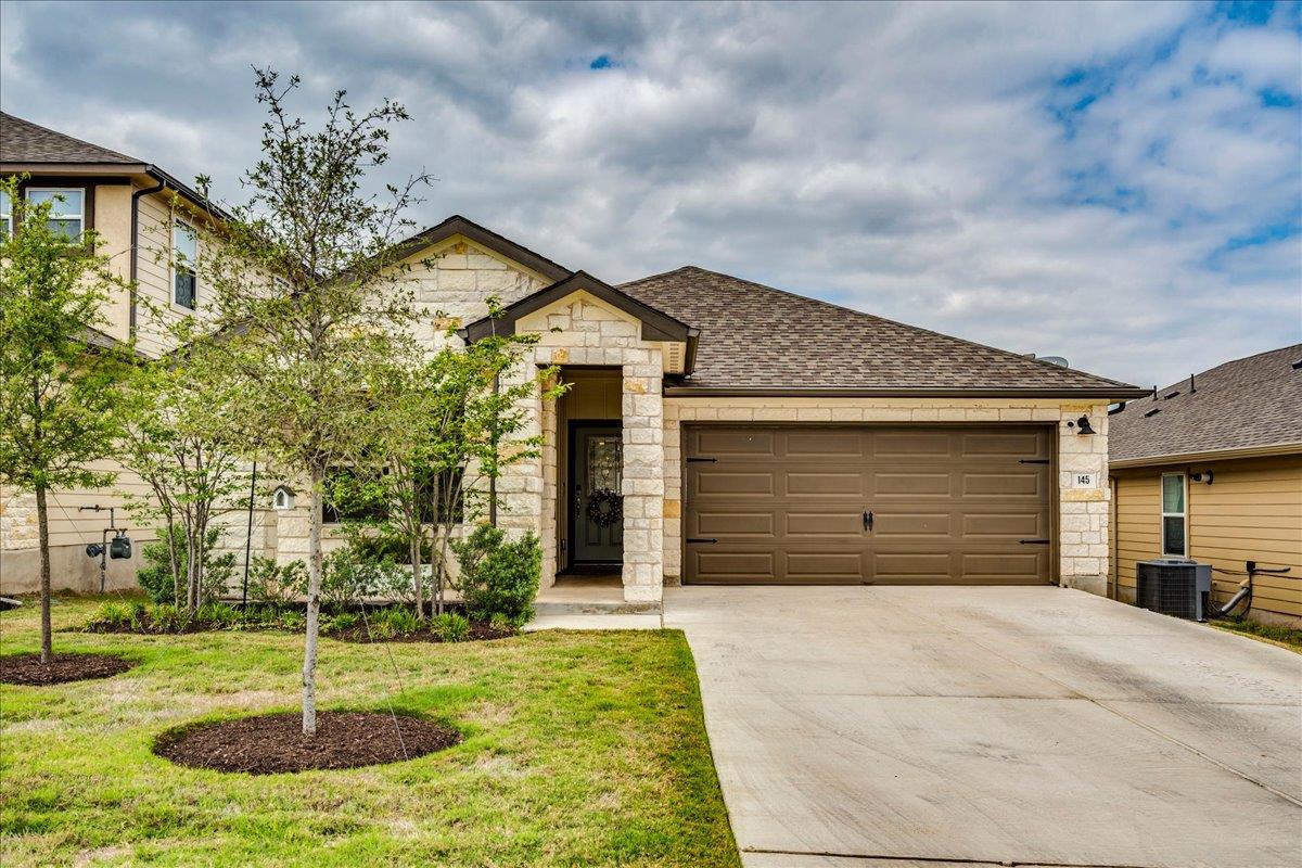 View 145 El Capitan Loop in Big Sky Ranch Ph 3 At Dripping Spgs 145 El Capitan Loop - front exterior - Luxury home in Big Sky Ranch Ph 3 At Dripping Spgs, Dripping Springs, TX