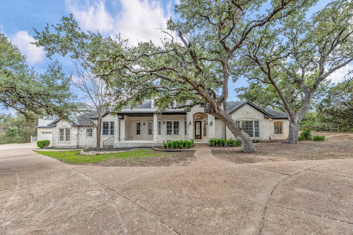 View 14949 FM 1826 in N/A 14949 FM 1826 - front exterior with single-story residence - Luxury home in N/A, Austin, TX
