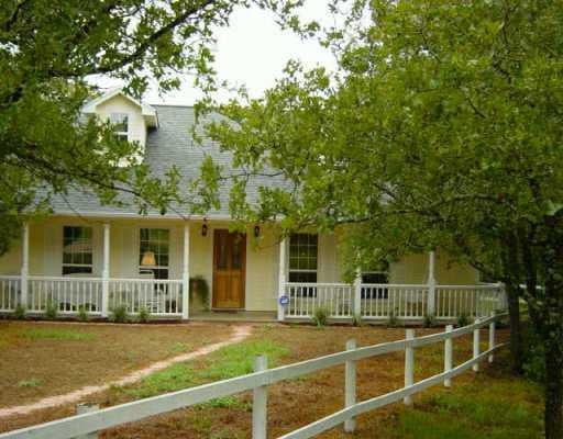 View 150 Spencewood DR 150 Spencewood DR - front exterior - Luxury home in Bastrop, TX