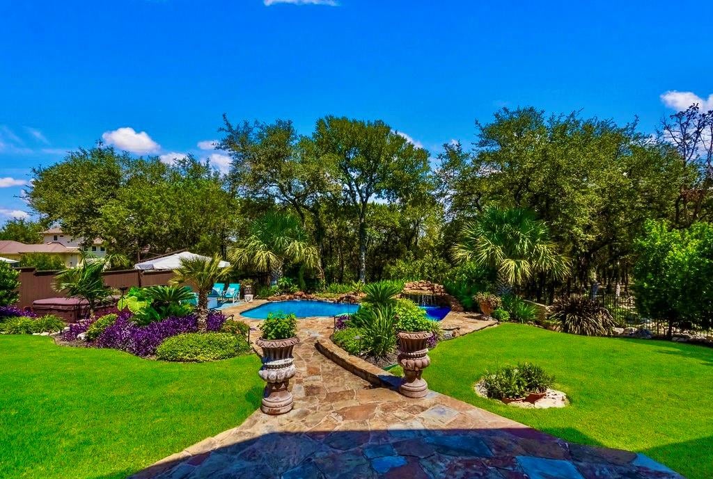 View 15002 NIGHTINGALE Ln in Cardinal Hills Unit 01 15002 NIGHTINGALE Ln - front exterior - Luxury home in Cardinal Hills Unit 01, Austin, TX