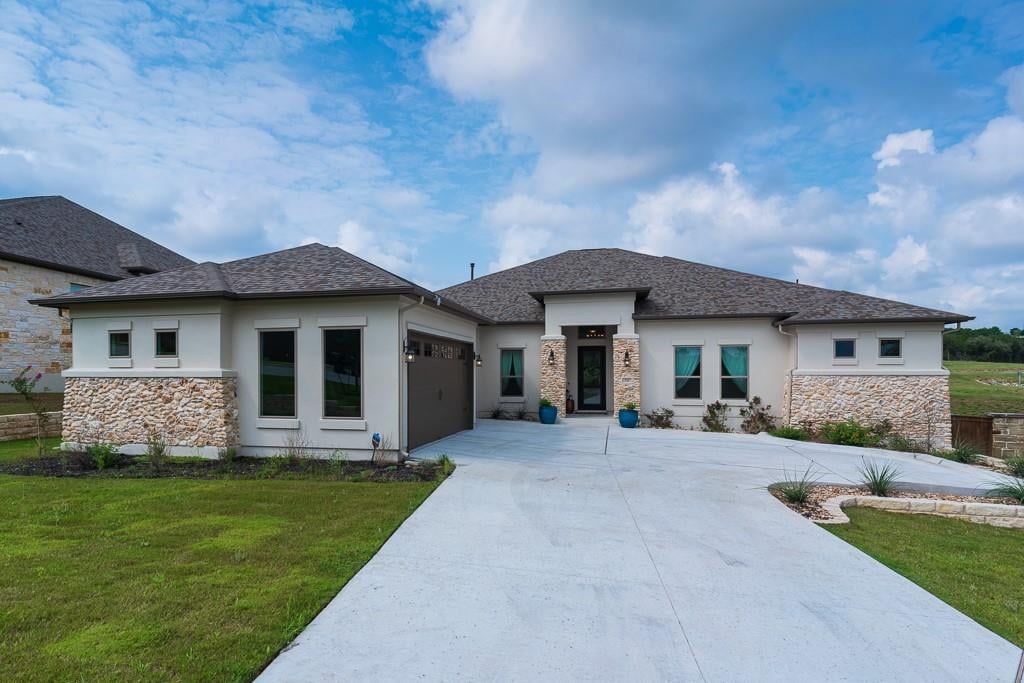 View 151 Drennan Ln in Belterra Ph 4 Sec 19b 151 Drennan Ln - front exterior - Luxury home in Belterra Ph 4 Sec 19b, Austin, TX