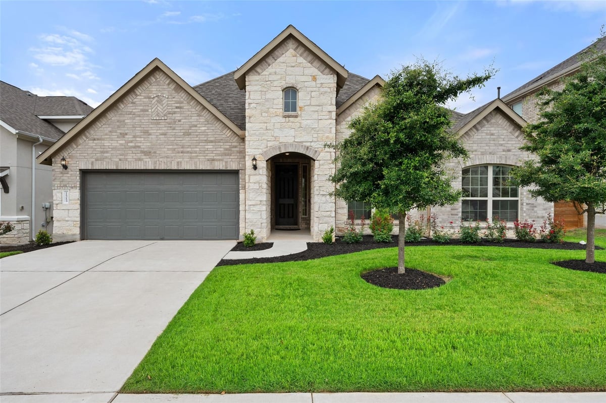 View 1513 Hinterwald ST in Bluffview Ph 1 1513 Hinterwald ST - front exterior - Luxury home in Bluffview Ph 1, Leander, TX