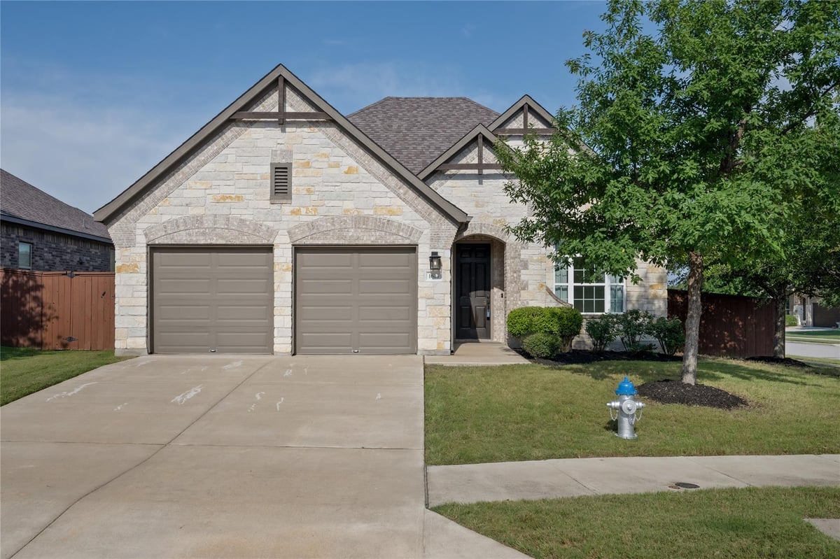 View 1613 Long Shadow LN in Oaks at San Gabriel 1613 Long Shadow LN - front exterior - Luxury home in Oaks at San Gabriel, Georgetown, TX