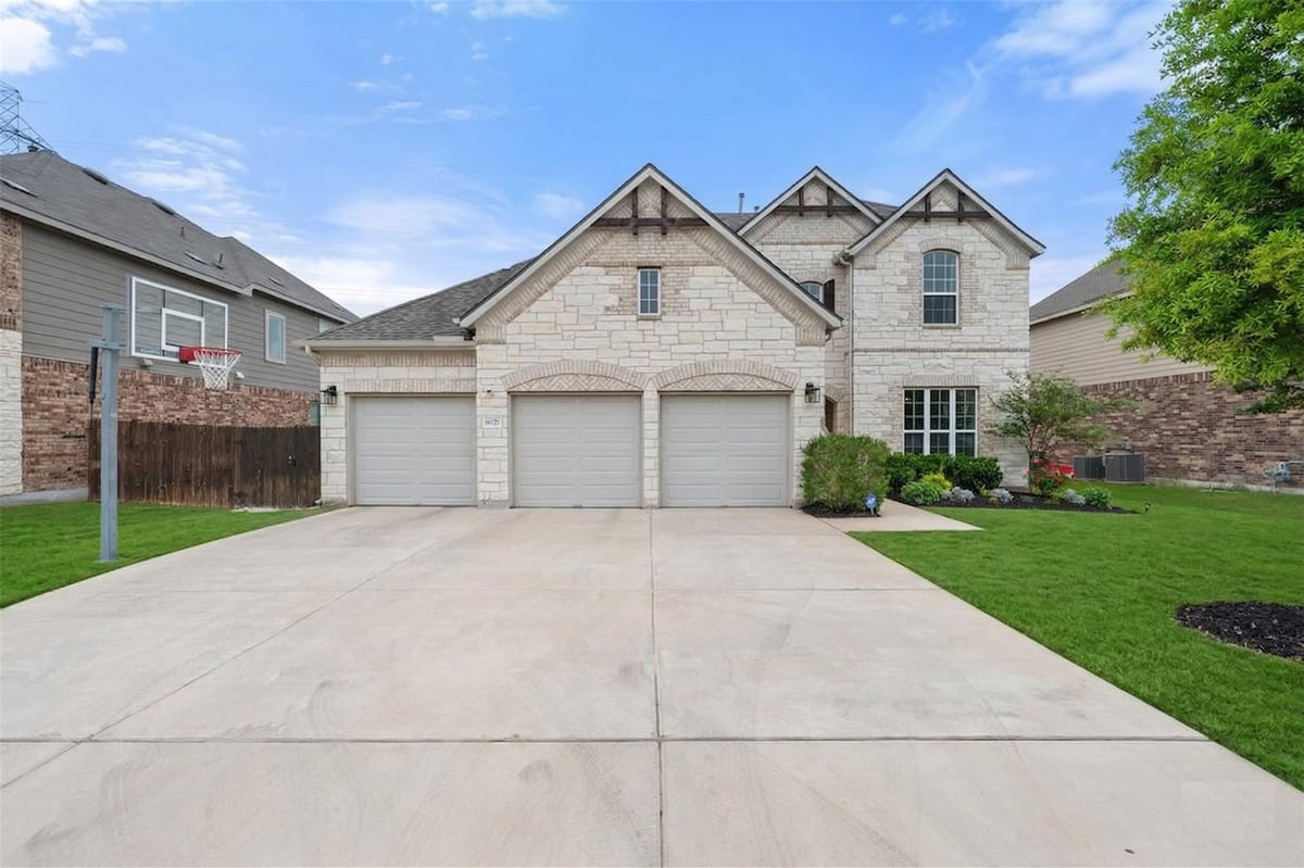 View 16721 Caperi Dr in Carmel 16721 Caperi Dr - front exterior - Luxury home in Carmel, Pflugerville, TX