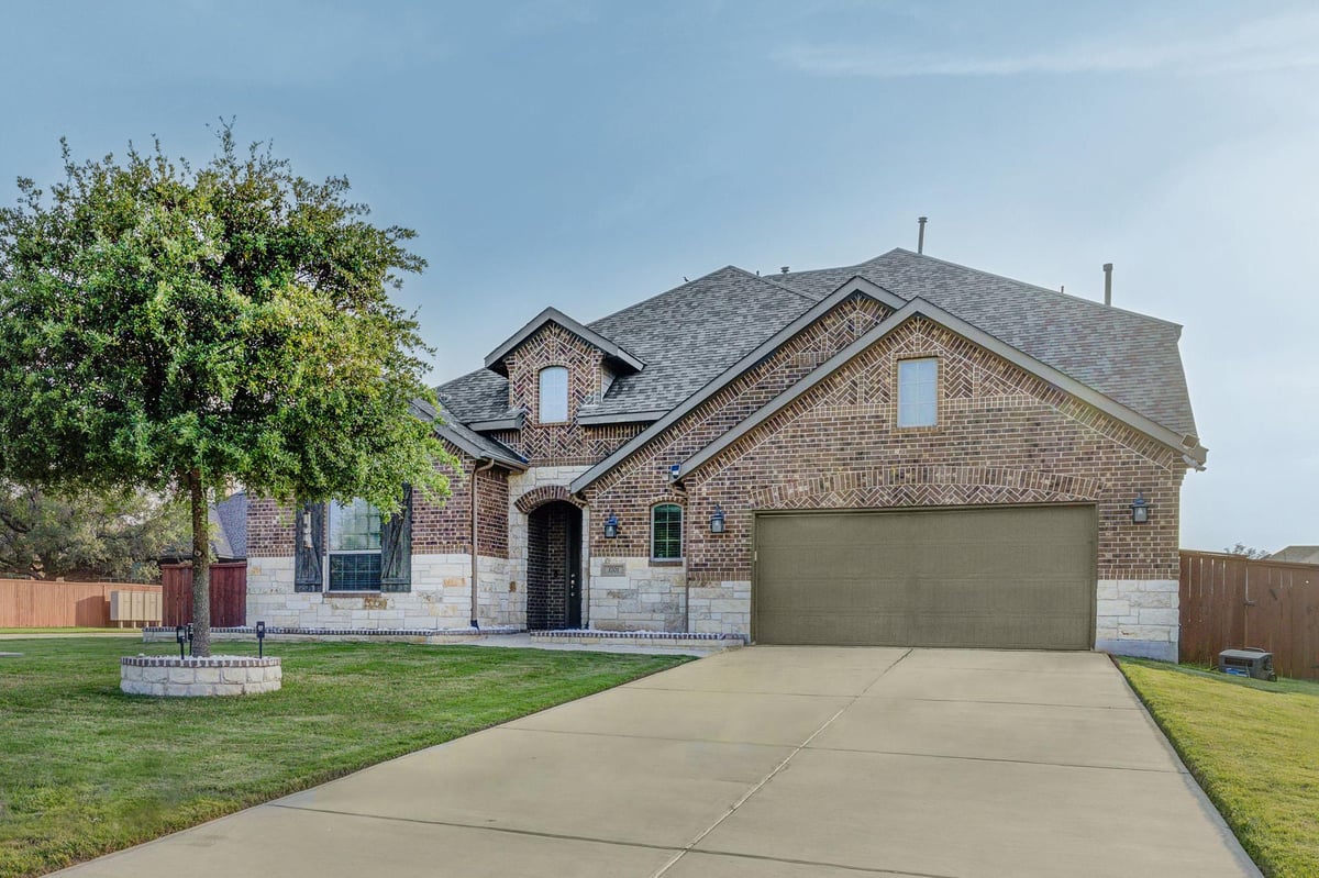 View 1701 Highland Ridge Rd in OAKS AT SAN GABRIEL 1701 Highland Ridge Rd - front exterior - Luxury home in OAKS AT SAN GABRIEL, Georgetown, TX