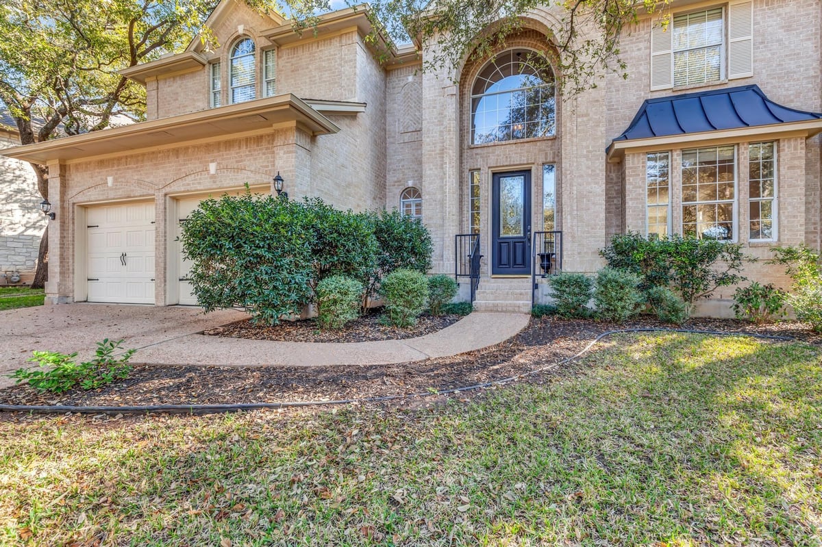 View 17030 Capri Isle Ln in Oak Brook Sec 1 17030 Capri Isle Ln - front exterior - Luxury home in Oak Brook Sec 1, Austin, TX