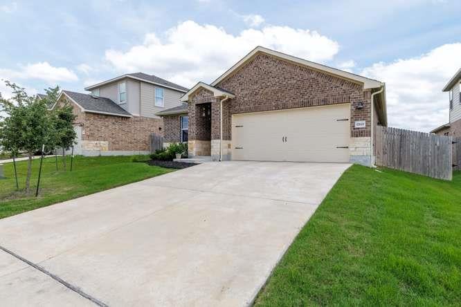 View 17621 Fairbridge LN in Shadowglen 17621 Fairbridge LN - front exterior - Luxury home in Shadowglen, Manor, TX