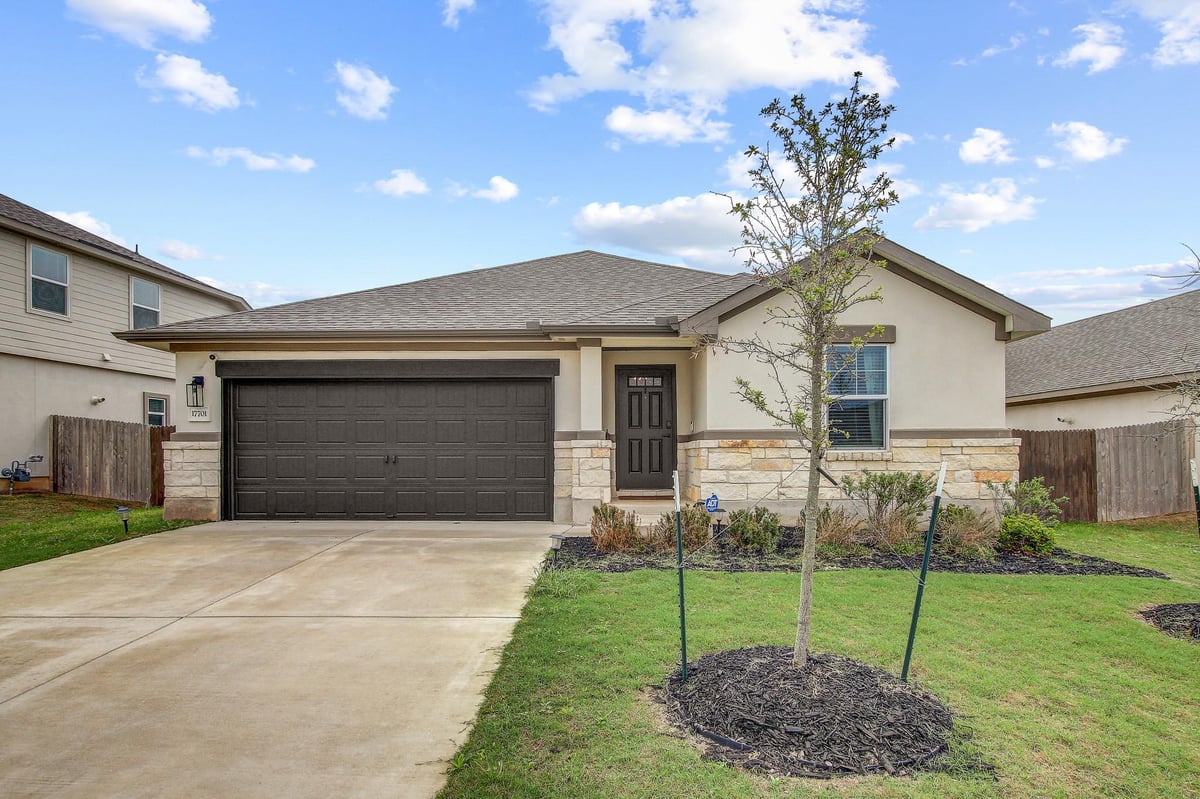 View 17701 Owl Tree Rd in Shadowglen Ph 2 Secs 27A-27B 17701 Owl Tree Rd - front exterior - Luxury home in Shadowglen Ph 2 Secs 27A-27B, Manor, TX