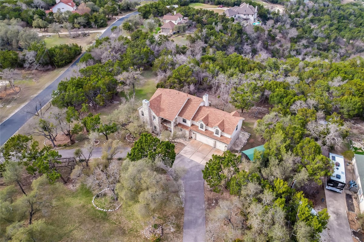 View 17706 N Rim Dr in North Rim 17706 N Rim Dr - front exterior - Luxury home in North Rim, Leander, TX