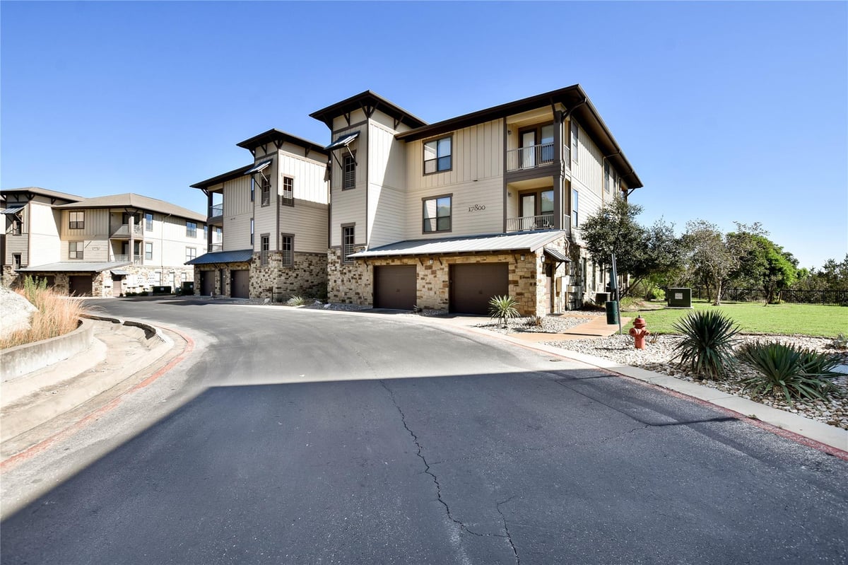 View 17800 Maritime Point DR Unit #101 in Hollows Condo Hilltop Vi 17800 Maritime Point DR Unit #101 - front exterior - Luxury home in Hollows Condo Hilltop Vi, Jonestown, TX