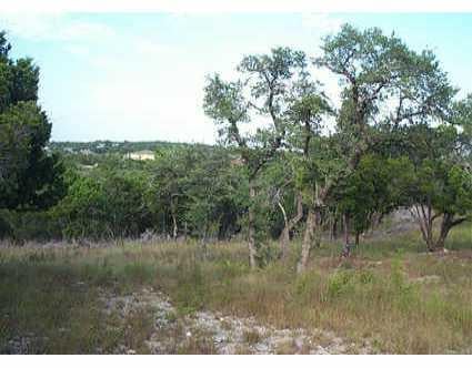 View 18004 Hideaway Cv 18004 Hideaway Cv - front exterior - Luxury lot in Dripping Springs, TX