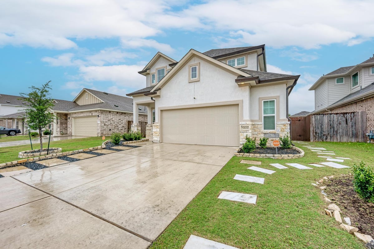 View 18217 Emu LN in Village/Manor Commons Ph 2 18217 Emu LN - front exterior - Luxury home in Village/Manor Commons Ph 2, Manor, TX