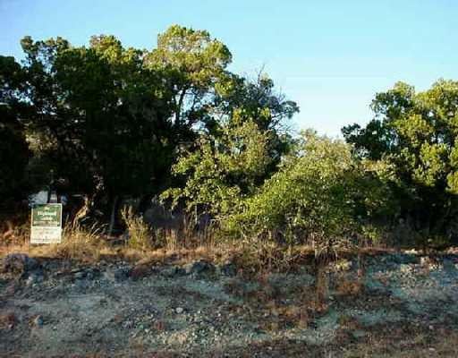 View 18502 Venture Dr 18502 Venture Dr - front exterior - Luxury lot in Point Venture, TX