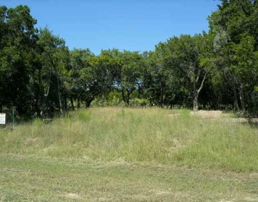 View 18610 Champions CIR 18610 Champions CIR - front exterior - Luxury lot in Point Venture, TX