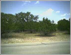 View 18808 Venture DR 18808 Venture DR - front exterior - Luxury lot in Point Venture, TX