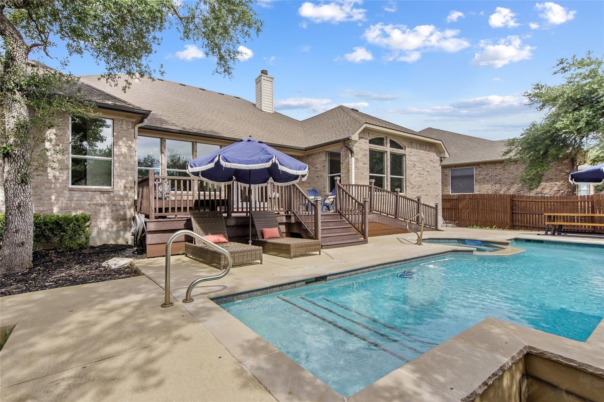 View 195 Cork Ln in Belterra Ph Ii Sec 9A 195 Cork Ln - front exterior - Luxury home in Belterra Ph Ii Sec 9A, Austin, TX