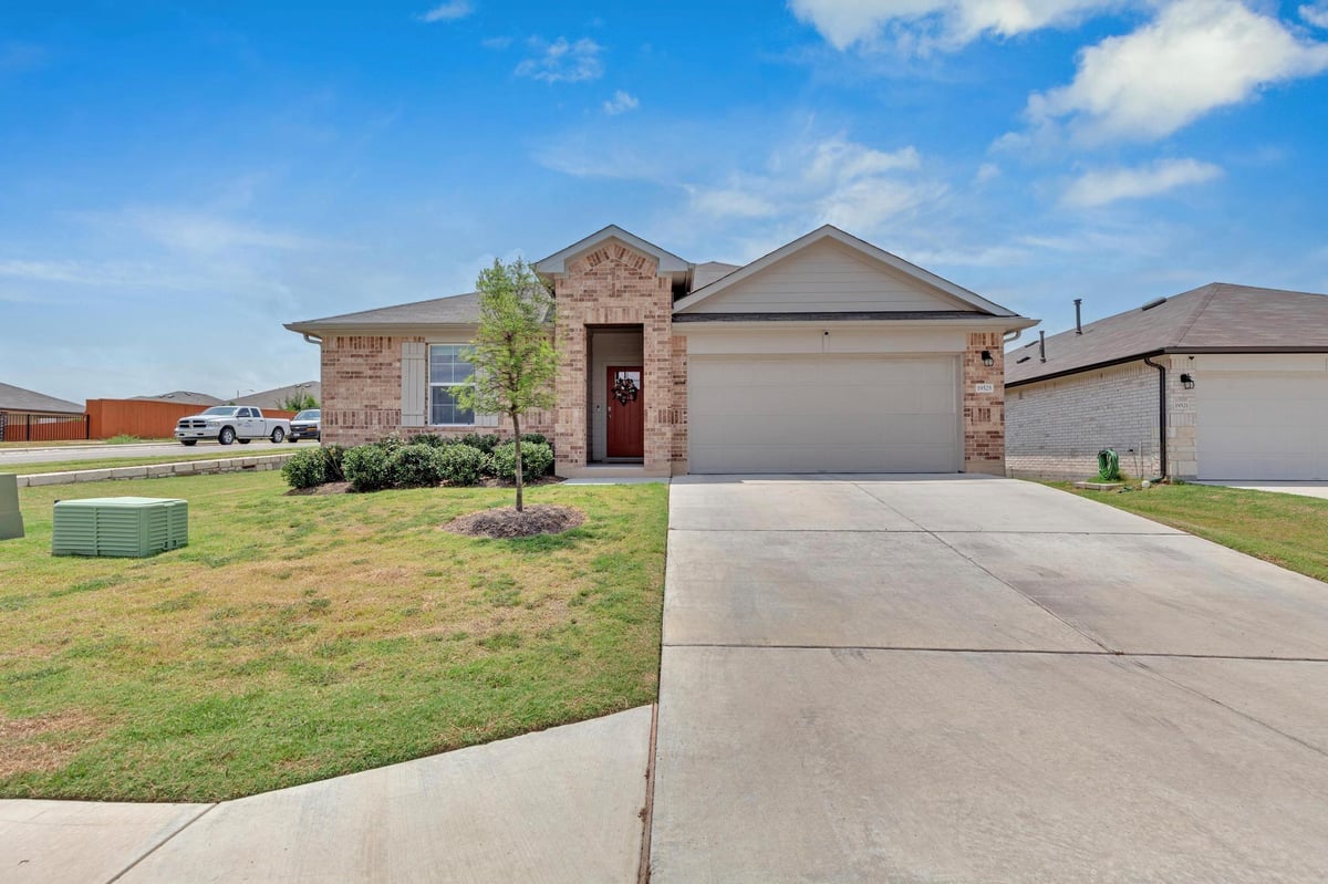 View 19525 Abigail Fillmore Rd in Manor Heights 19525 Abigail Fillmore Rd - front exterior - Luxury home in Manor Heights, Manor, TX