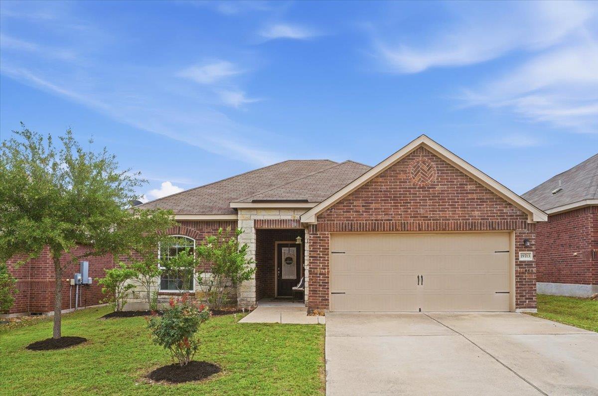 View 19713 James Manor St in Presidential Glen Ph 4B 19713 James Manor St - front exterior - Luxury home in Presidential Glen Ph 4B, Manor, TX
