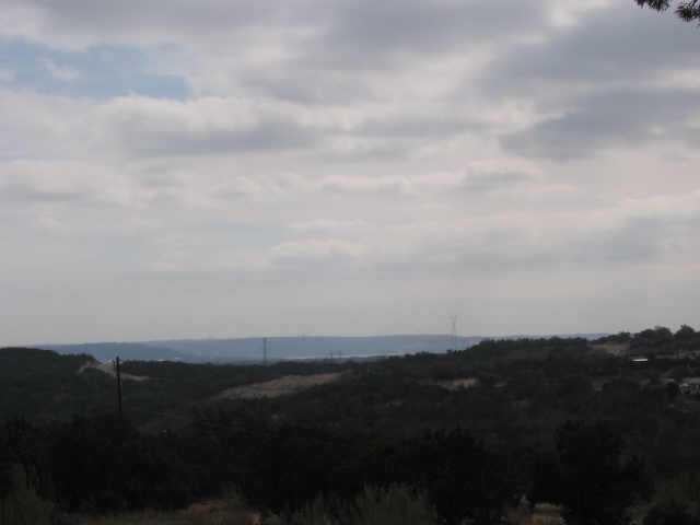 View 19808 Dos Amigo DR 19808 Dos Amigo DR - front exterior - Luxury lot in Lago Vista, TX