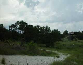 View 19912 Agua Frio 19912 Agua Frio - front exterior - Luxury lot in Lago Vista, TX