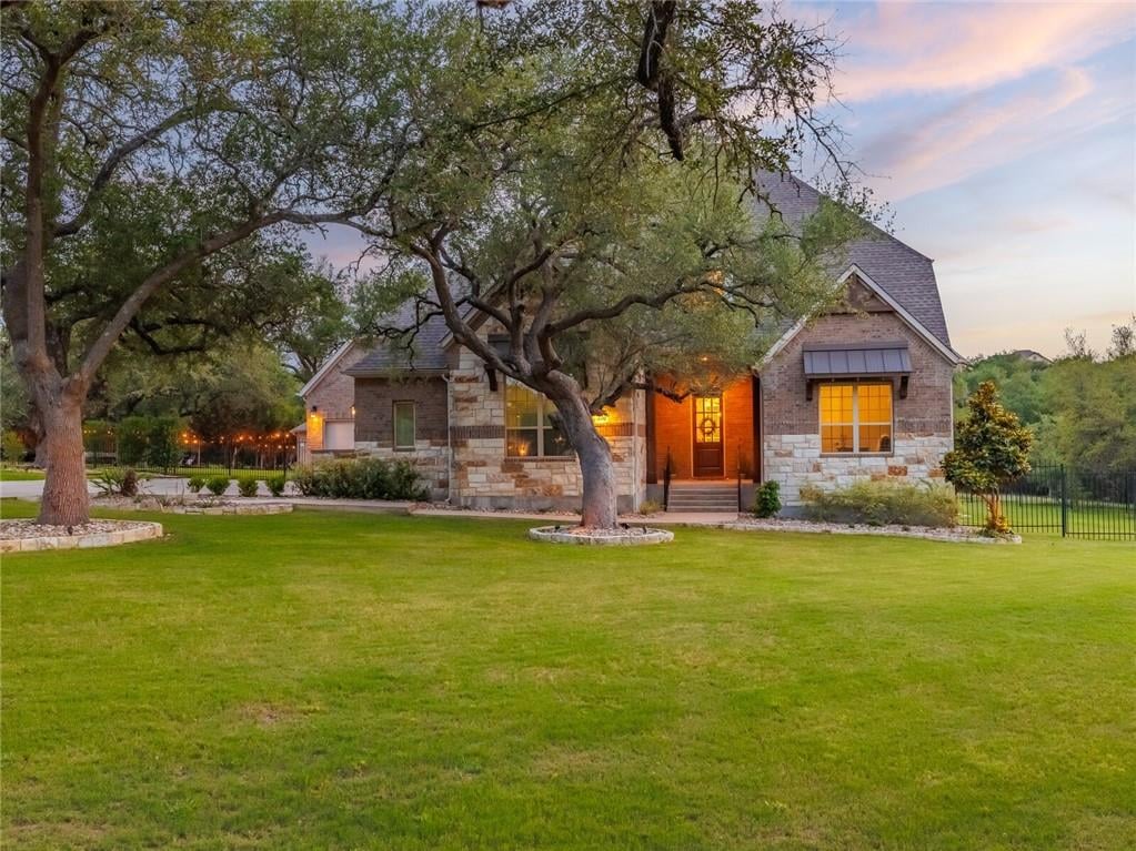 View 200 Charismatic Pl in Saratoga Hills 200 Charismatic Pl - front exterior - Luxury home in Saratoga Hills, Austin, TX