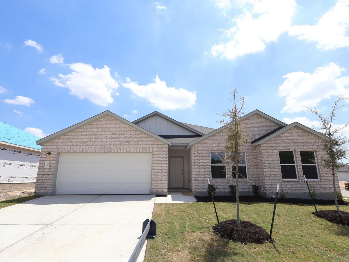 20021 Cornyn LN - front exterior - Luxury home in Carillon, Manor, TX