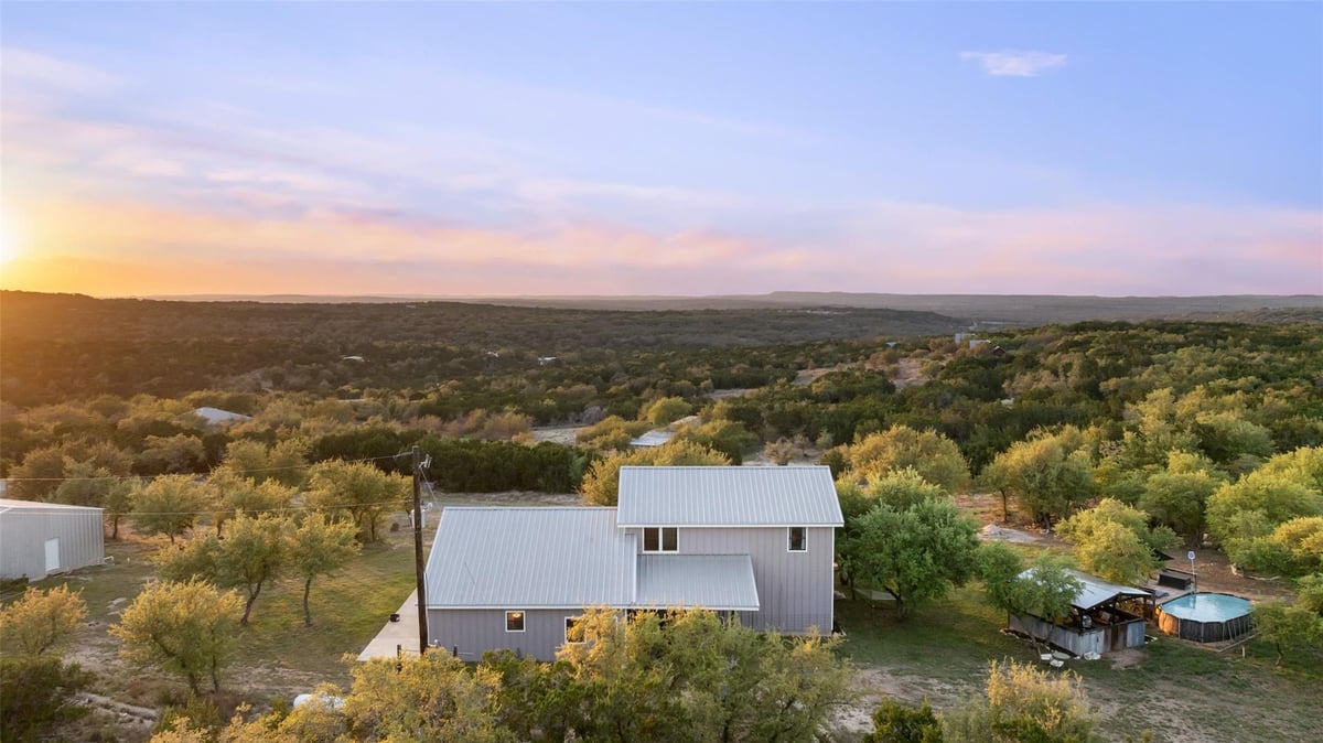 2025 Cripple Creek Stage Rd - front exterior - Luxury home in Stagecoach Ranch Sec 03, Dripping Springs, TX