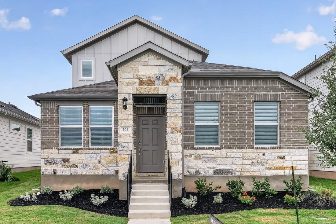 View 203 Betsy RD in Emory Crossing 203 Betsy RD - front exterior - Luxury home in Emory Crossing, Hutto, TX