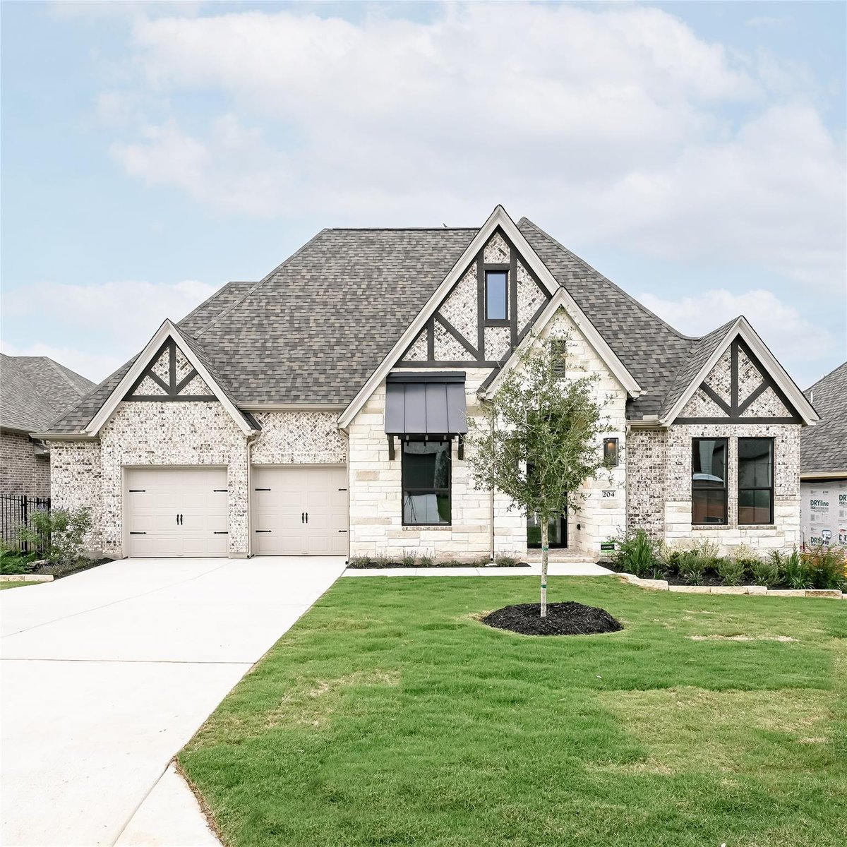 View 204 Leaning Rock RDG in Parten 204 Leaning Rock RDG - front exterior - Luxury home in Parten, Austin, TX