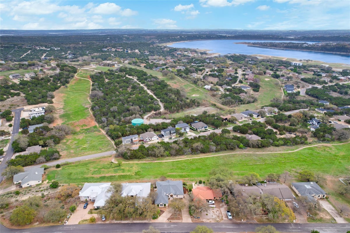 View 20711 Henry Ave in Highland Lake Estates Sec 15 20711 Henry Ave - front exterior - Luxury home in Highland Lake Estates Sec 15, Lago Vista, TX